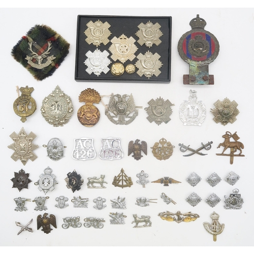 478 - A collection of military cap and other badges, to include the Seaforth Highlanders, Black Watch, Arg... 