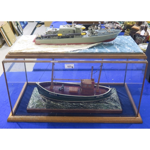 523 - A model fishing boat named Anne, AH. 153, housed in a glass case measuring approx. 65cm x 35cm x 31c... 