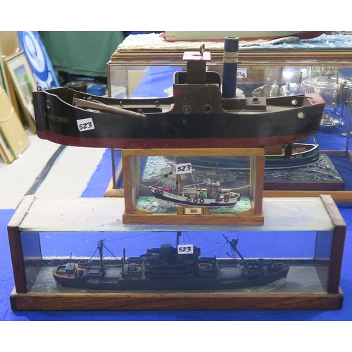 523 - A model fishing boat named Anne, AH. 153, housed in a glass case measuring approx. 65cm x 35cm x 31c... 