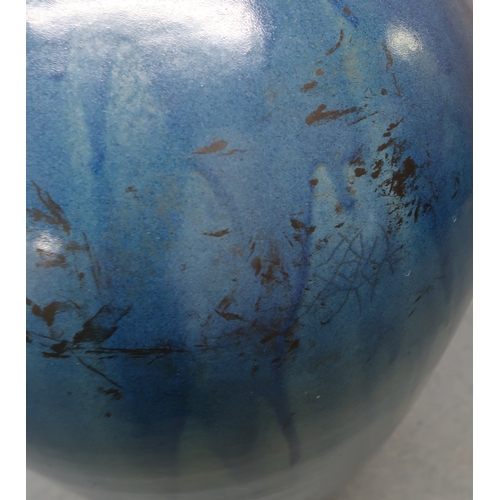 2323 - ALICE MACFARLANEAn oversized studio pottery vase of shouldered tapering form, in blue glaze, 95cm hi... 