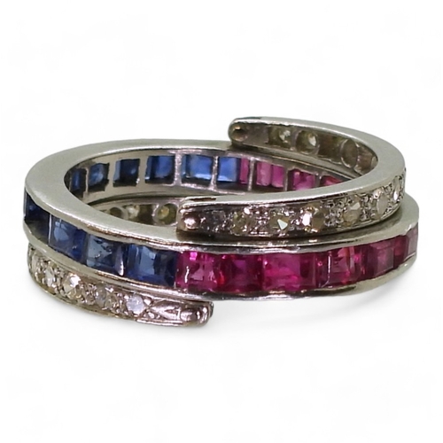 2774 - A NIGHT & DAY RINGthe white metal mount, set with sapphires, rubies & diamonds, the flip des... 