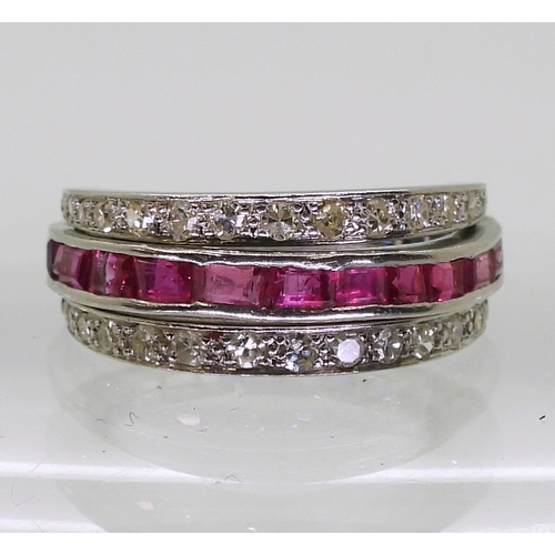 2774 - A NIGHT & DAY RINGthe white metal mount, set with sapphires, rubies & diamonds, the flip des... 