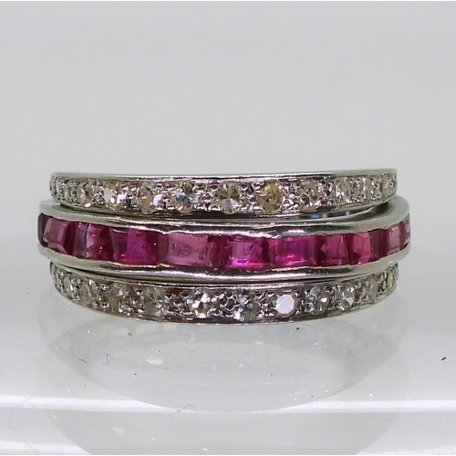 2774 - A NIGHT & DAY RINGthe white metal mount, set with sapphires, rubies & diamonds, the flip des... 