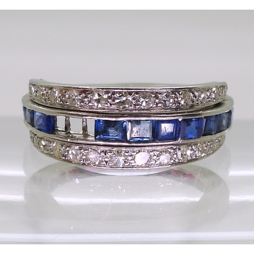 2774 - A NIGHT & DAY RINGthe white metal mount, set with sapphires, rubies & diamonds, the flip des... 