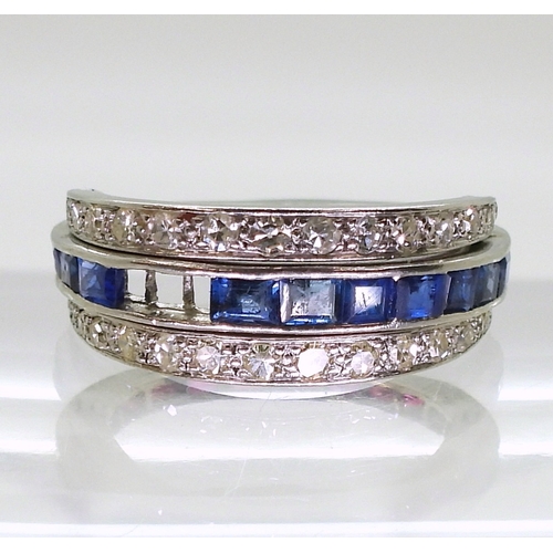 2774 - A NIGHT & DAY RINGthe white metal mount, set with sapphires, rubies & diamonds, the flip des... 