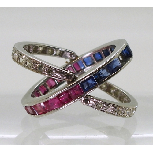 2774 - A NIGHT & DAY RINGthe white metal mount, set with sapphires, rubies & diamonds, the flip des... 