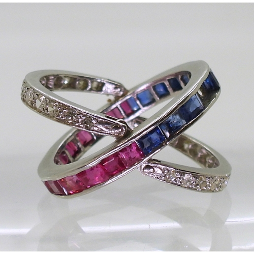 2774 - A NIGHT & DAY RINGthe white metal mount, set with sapphires, rubies & diamonds, the flip des... 