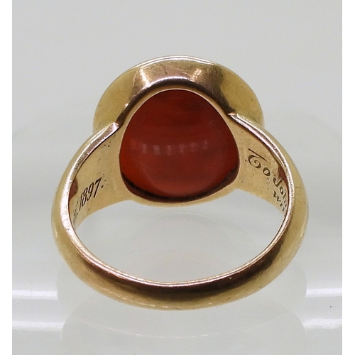 2776 - A GLADIATOR INTAGLIO RINGthe carved carnelian, is set in a yellow metal ring, the inner shank inscri... 