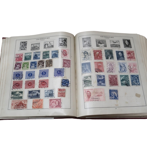 396 - Four albums of stamps to include worldwide stamp collections in The Strand Stamp Album, The Cosmos S... 