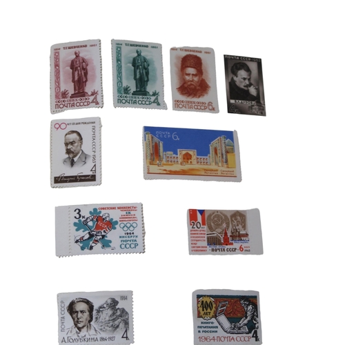 396 - Four albums of stamps to include worldwide stamp collections in The Strand Stamp Album, The Cosmos S... 