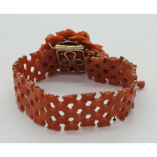 2779 - A SUITE OF CORAL JEWELSa bracelet, with carved flowers and leaves, yellow metal clasp, can be shorte... 