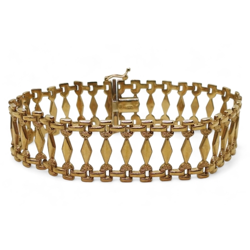 2780 - A 9CT GOLD BRACELETwith fancy baton links, length 19.5cm, width 1.8cm, weight 10.6gms... 