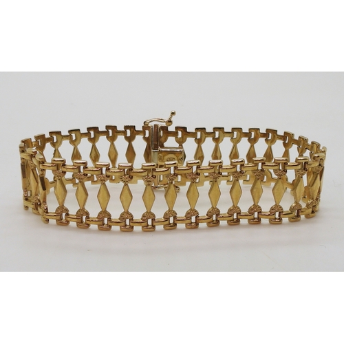 2780 - A 9CT GOLD BRACELETwith fancy baton links, length 19.5cm, width 1.8cm, weight 10.6gms... 