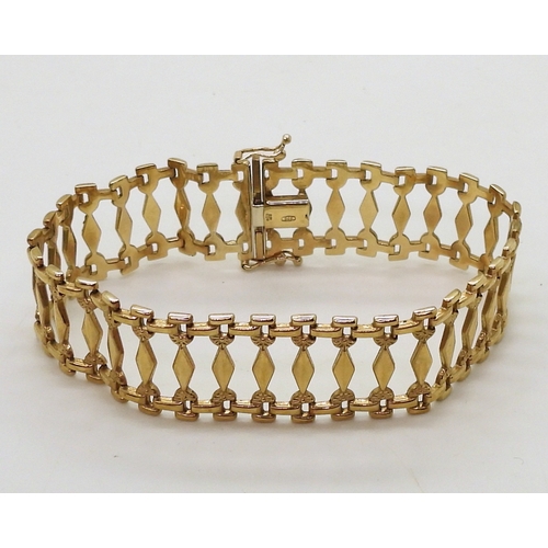 2780 - A 9CT GOLD BRACELETwith fancy baton links, length 19.5cm, width 1.8cm, weight 10.6gms... 