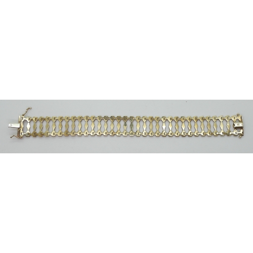 2780 - A 9CT GOLD BRACELETwith fancy baton links, length 19.5cm, width 1.8cm, weight 10.6gms... 