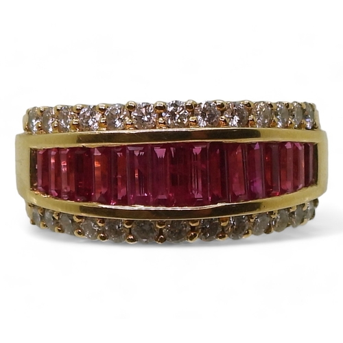 2783 - A RUBY & DIAMOND RINGmounted in 18ct gold, with a band of calibre cut ruby baguettes and two ban... 