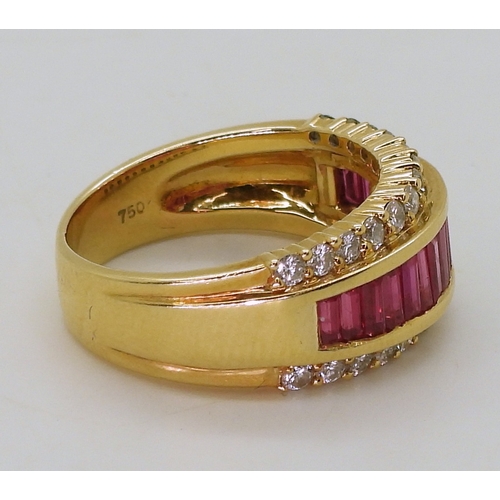 2783 - A RUBY & DIAMOND RINGmounted in 18ct gold, with a band of calibre cut ruby baguettes and two ban... 