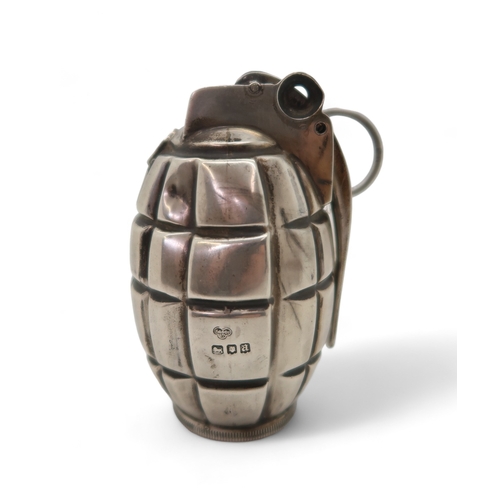 2528 - A GEORGE V NOVELTY SILVER HAND GRENADE CIGAR LIGHTERby Goldsmiths & Silversmiths Co Ltd, London ... 