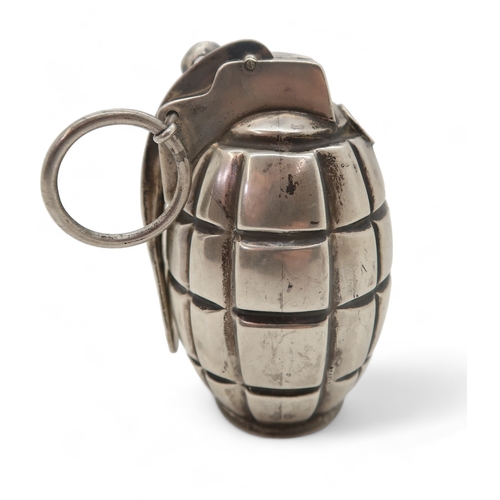 2528 - A GEORGE V NOVELTY SILVER HAND GRENADE CIGAR LIGHTERby Goldsmiths & Silversmiths Co Ltd, London ... 