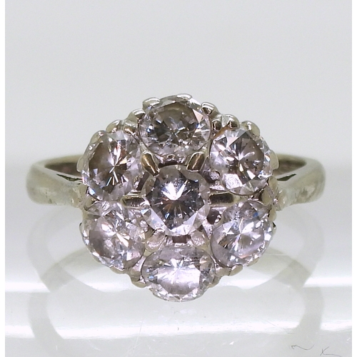 2795 - A DIAMOND FLOWER RINGthe classic mount in 18ct white gold is set with estimated approx 1.75cts of br... 