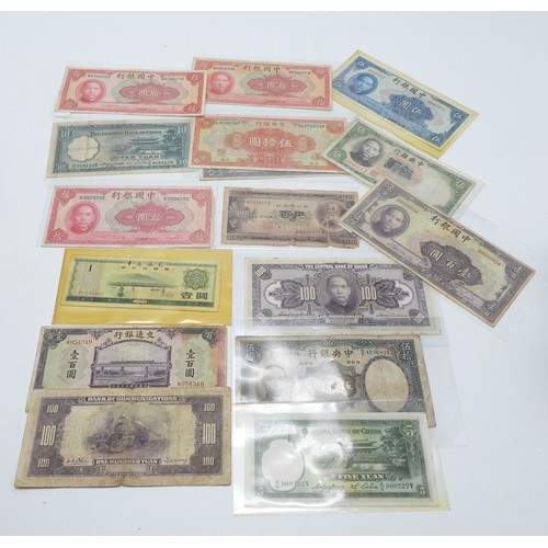 382 - A lot comprising Chinese bank notes Bank of China, Bank of Communications over stamped Shanghai, Cen... 