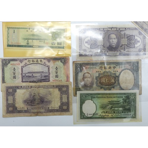 382 - A lot comprising Chinese bank notes Bank of China, Bank of Communications over stamped Shanghai, Cen... 