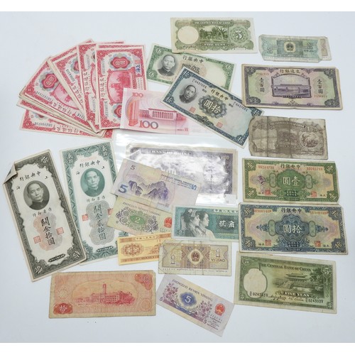 382 - A lot comprising Chinese bank notes Bank of China, Bank of Communications over stamped Shanghai, Cen... 