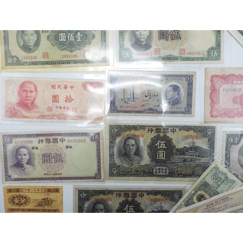 382 - A lot comprising Chinese bank notes Bank of China, Bank of Communications over stamped Shanghai, Cen... 