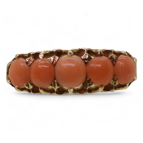 2787 - AN 18CT CORAL RINGwith Glasgow hallmarks for 1883, set with five corals to the classic scroll mount.... 