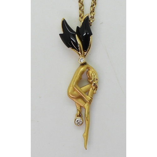 2791 - AN 18CT GOLD FAIRY PENDANTset with diamonds and onyx. Made by Spanish designers Carrera y Carrera, s... 