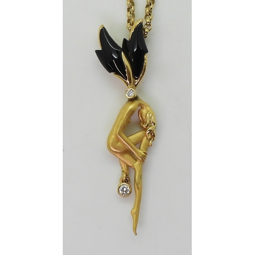 2791 - AN 18CT GOLD FAIRY PENDANTset with diamonds and onyx. Made by Spanish designers Carrera y Carrera, s... 