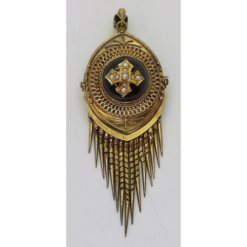 2801 - A VICTORIAN PENDANT BROOCHset with a high domed garnet set with a pearl cross, with granulation and ... 