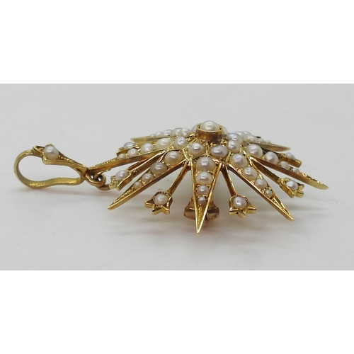 2806 - A VICTORIAN STAR PENDANT BROOCHin 15ct gold set throughout with split pearls. Diameter 3.4cm, length... 