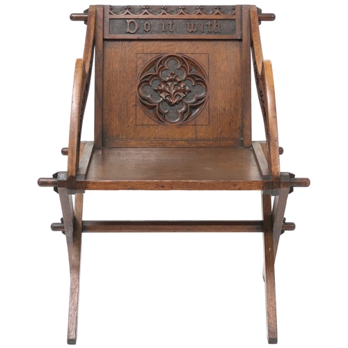 2002 - A 19TH CENTURY OAK PUGINESQUE STYLE GLASTONBURY CHAIR backrest and arms carved with bible verse... 