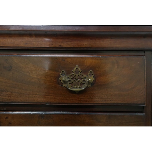 2008 - A GEORGIAN WALNUT CHEST ON CHEST with moulded cornice over four long drawers flanked by reeded ... 