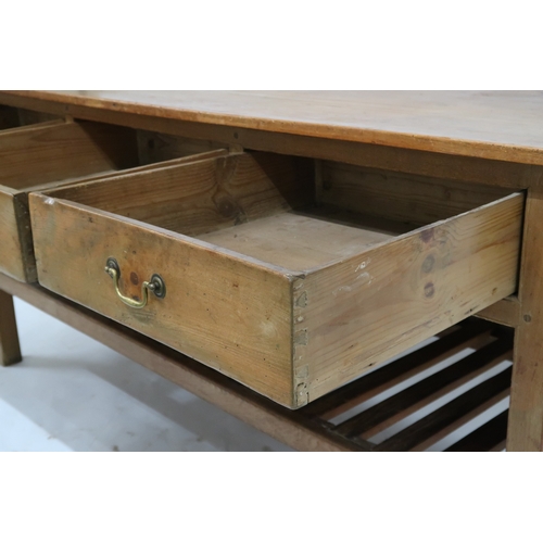 2010 - A 19TH CENTURY PINE FARMHOUSE  KITCHEN SERVING/LARDER TABLE with rectangular two plank top over thre... 