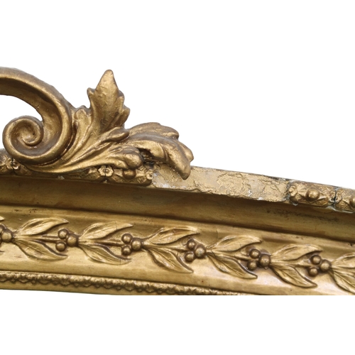 2011 - A LATE 19TH CENTURY GILT GESSO ROCOCO STYLE OVERMANTLE MIRRORwith scrolled surmount over arched fram... 