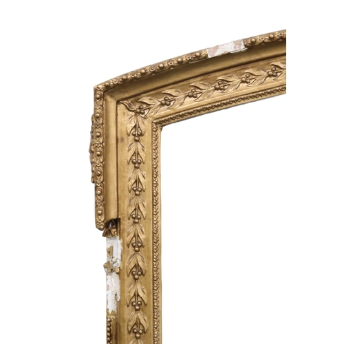 2011 - A LATE 19TH CENTURY GILT GESSO ROCOCO STYLE OVERMANTLE MIRRORwith scrolled surmount over arched fram... 