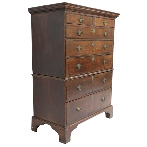 2020 - A GEORGIAN OAK CHEST ON CHEST top chest with moulded cornice over two short over three long dra... 