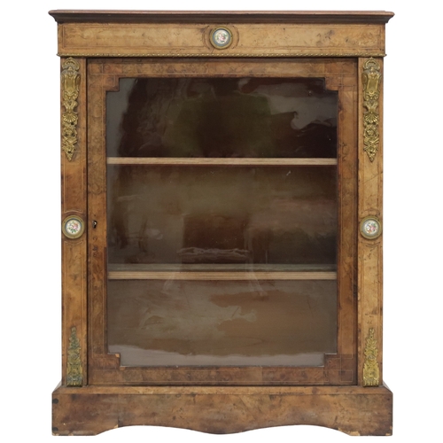 2021 - A VICTORIAN WALNUT AND SATINWOOD PIER CABINET with brass ormolu mounts and ceramic inset plaques sur... 