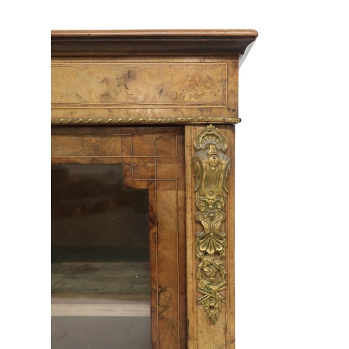 2021 - A VICTORIAN WALNUT AND SATINWOOD PIER CABINET with brass ormolu mounts and ceramic inset plaques sur... 