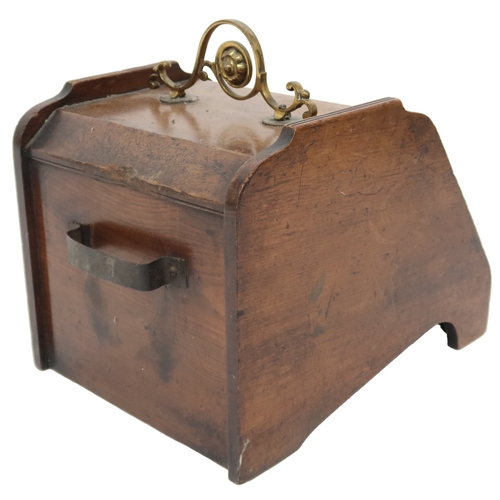 2022 - A LATE VICTORIAN OAK ARTS & CRAFTS COAL SCUTTLE with scrolled brass carry handle over hinged lid... 
