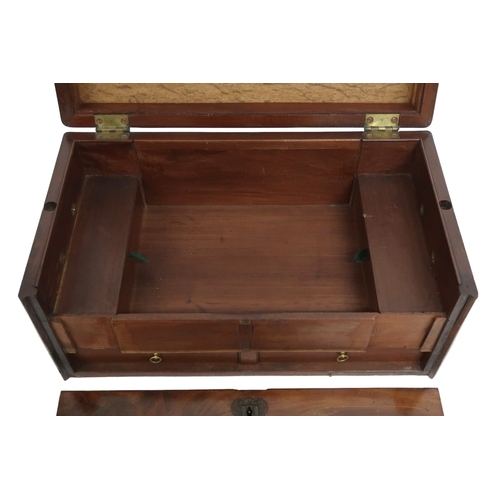 2023 - A GEORGIAN FLAME MAHOGANY STRONG BOX with twinned carry handles flanking hinged top concealing inter... 