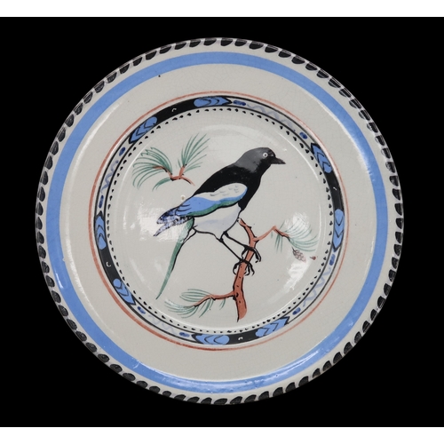 2240 - WILLIAM MILES JOHNSTON (1893-1974)A Zoo Pottery plate depicting a Magpie, painted marks and title to... 