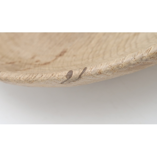 2251 - ROBERT MOUSEMAN THOMPSON OF KILBURN OAK FRUIT BOWLwith carved mouse to centre of bowl, 28.5cm diamet... 