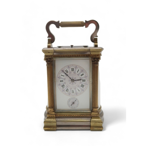 2257 - A HANHART BRASS AND WHITE METAL REPEATING CARRIAGE CLOCKthe white enamel face with lilac and purple ... 