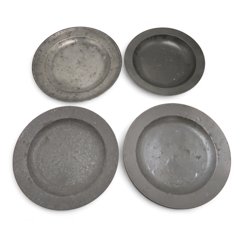 2261 - A COLLECTION OF CHURCH PEWTER CHARGERS, PLATES AND DISHESincluding an example by Robert Whyte of Edi... 