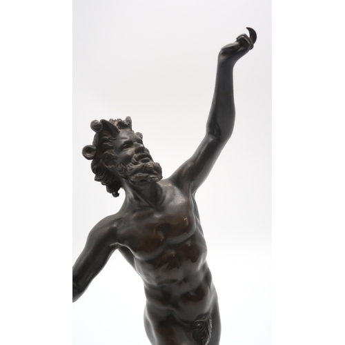 2266 - A GRAND TOUR STYLE BRONZEmodelled as the Dancing Faun of Pompeii, upon marble base, 34cm high... 