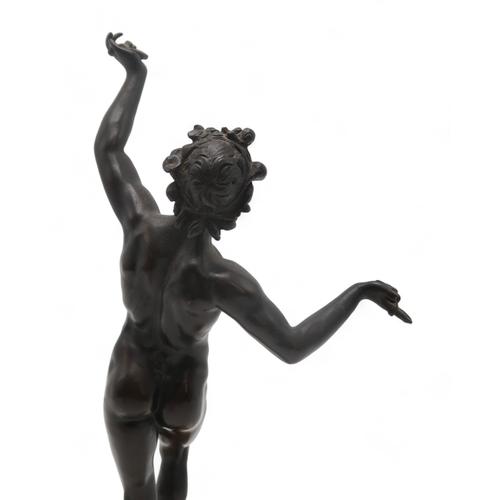 2266 - A GRAND TOUR STYLE BRONZEmodelled as the Dancing Faun of Pompeii, upon marble base, 34cm high... 