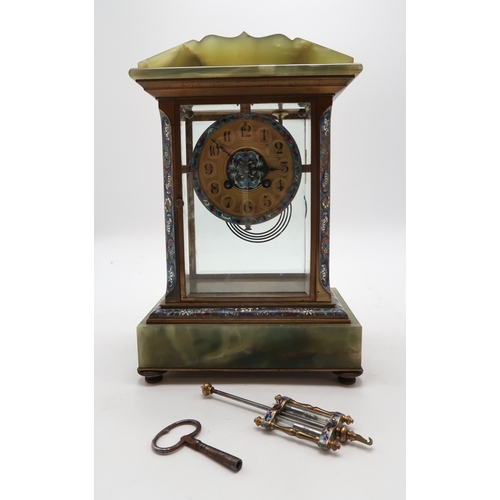 2267 - A FRENCH CHAMPLEVE ENAMEL AND ONYX CLOCK GARNITUREthe clock of rectangular form with gilded dial, bl... 